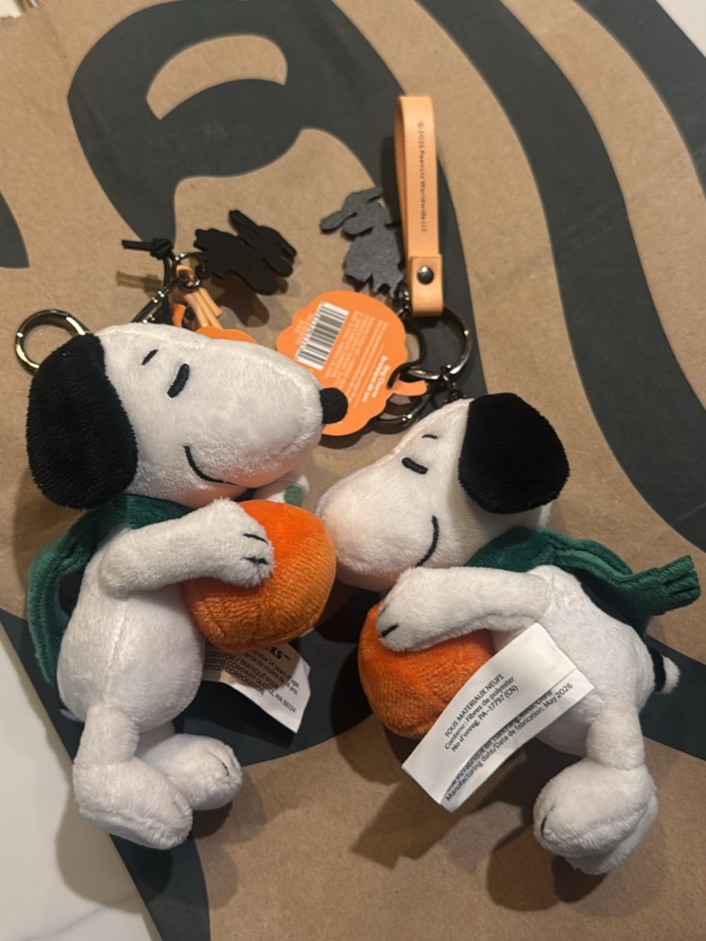 Peanuts Snoopy Plush Keychain with Orange Ball and Green Scarf